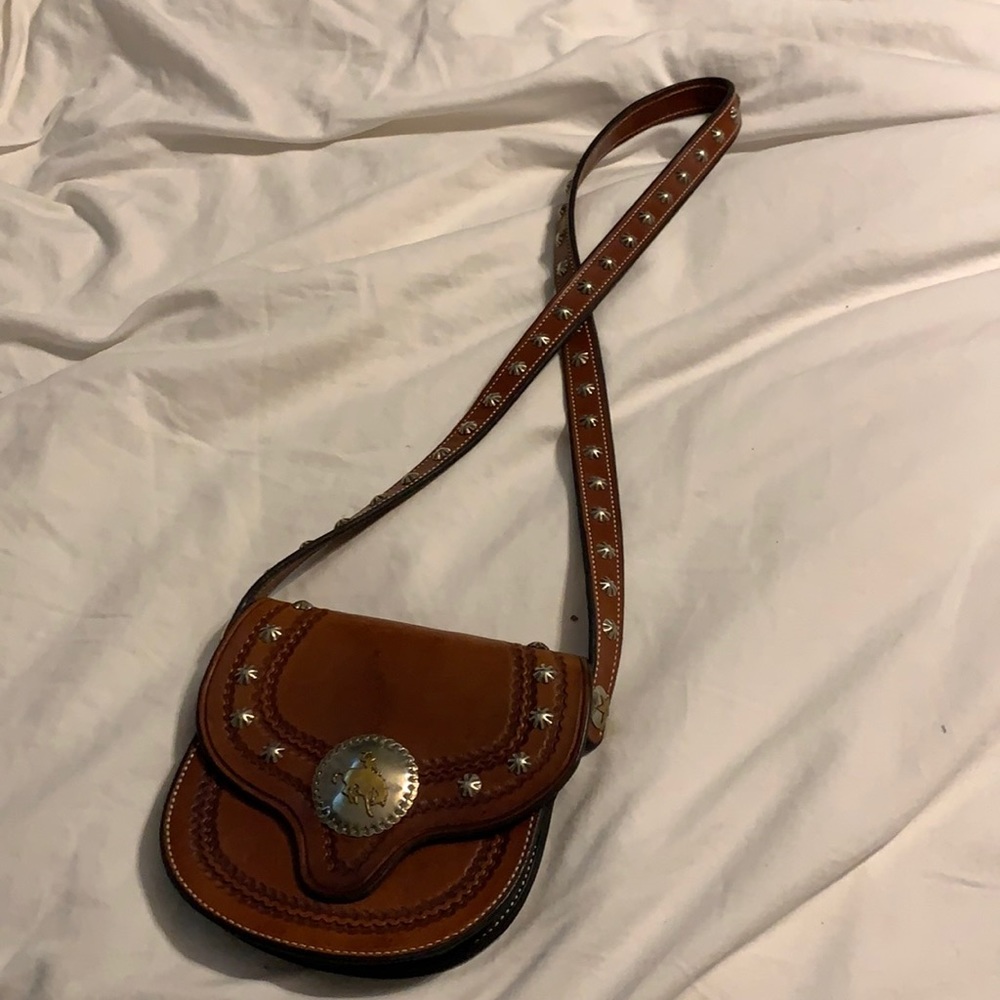 Super cool, small shoulder bag. Lots of silver!